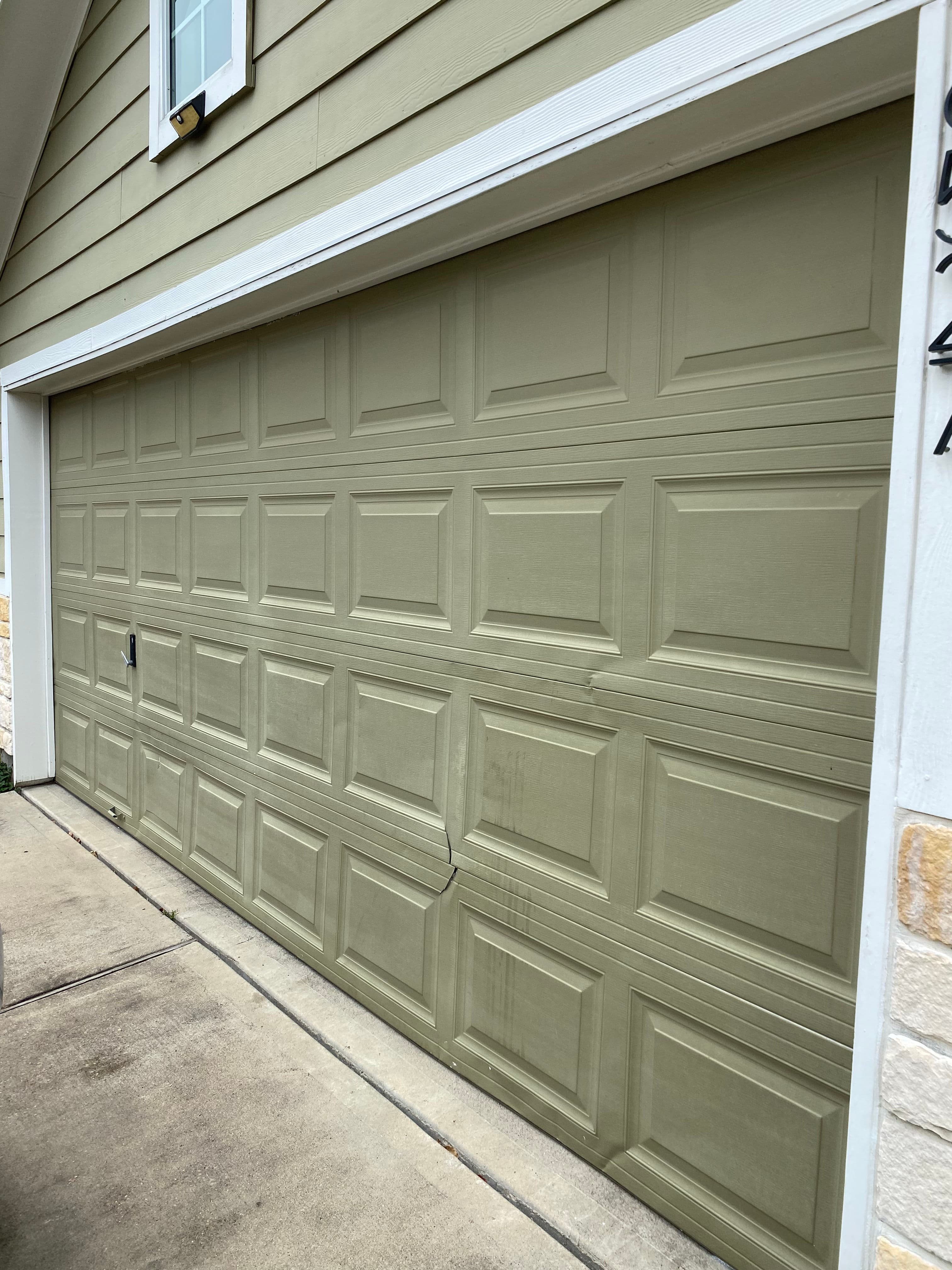Garage Door Makeover with Broken Panel Replacement